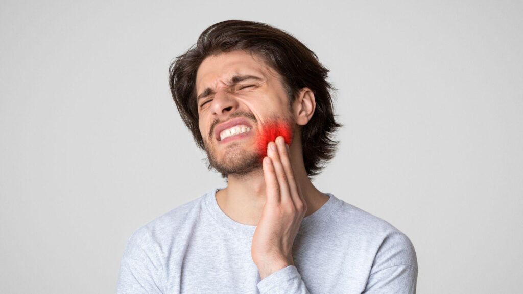 early signs of dental problems, detect dental issues early, warning signs tooth decay, gum disease symptoms, identify cavity symptoms, prevent costly dental treatments, dental health tips, signs of oral infection, affordable dental care, local dental clinic